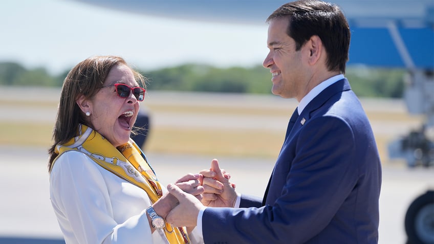 El Salvador's Foreign Minister Alexandra Hill Tinoco welcomes U.S. Secretary of State Marco Rubio