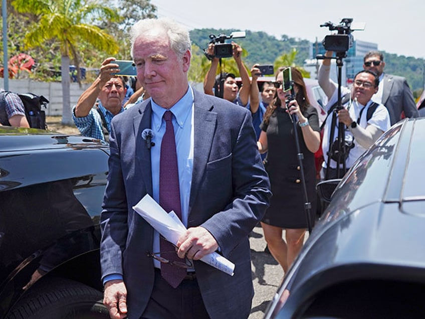 Maryland Sen. Chris Van Hollen walks away after speaking to the press in La Libertad, El S