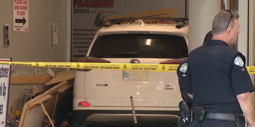 elderly driver plows into los angeles car dealership dragging customer 20 feet to her death