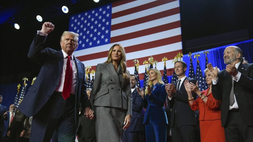 Trump and Melania on stage at Mar-a-Lago