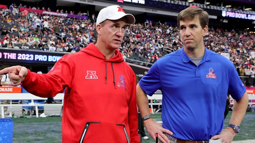 Peyton and Eli Manning coaching