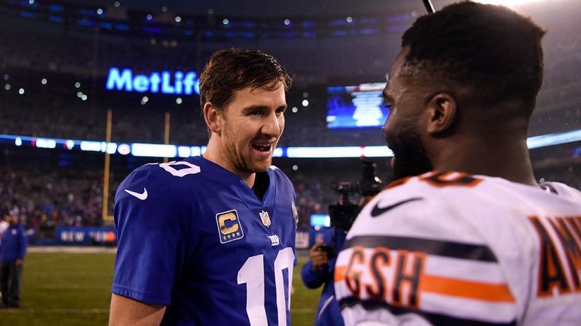 Eli Manning and Prince Amukamara