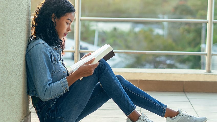 Person reading a book