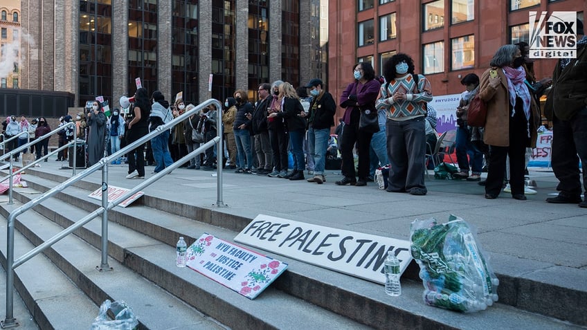 Hundreds of anti-Israel agitators stage a demonstration outside of NYU’s Stern School of Business in Manhattan