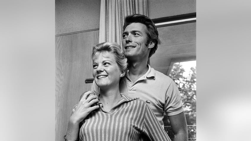 Clint Eastwood with his arm around Maggie Eastwood.