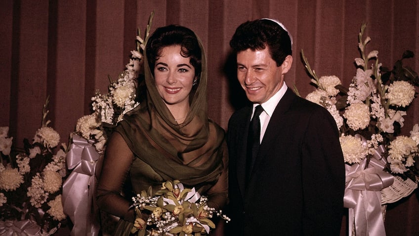 Elizabeth Taylor and Eddie Fisher getting married.