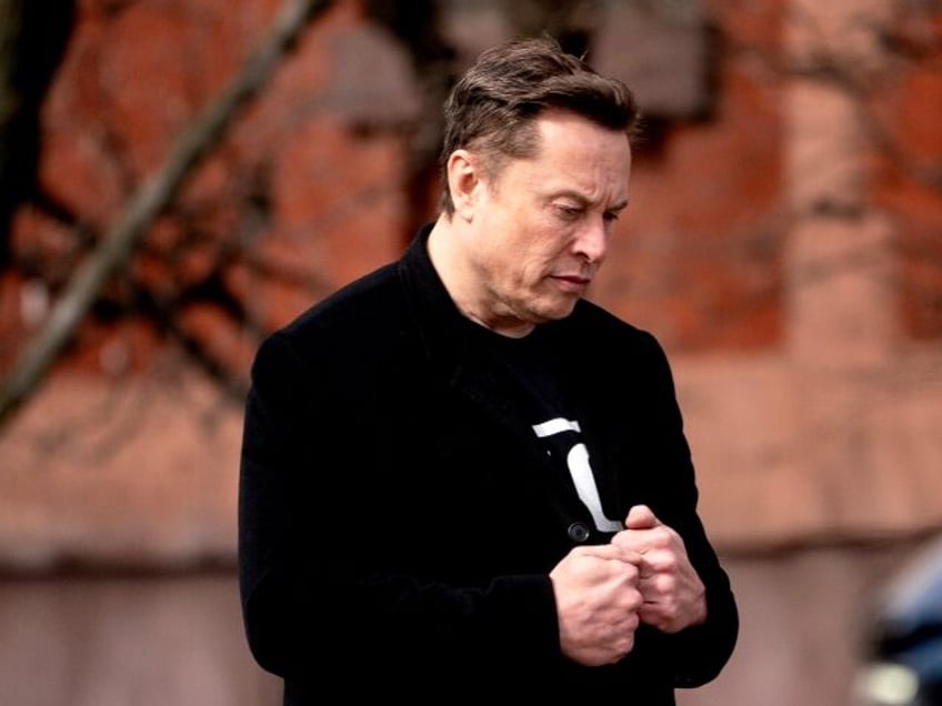 Elon Musk looking troubled by Tesla news