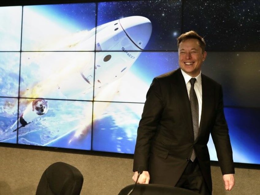 Elon Musk, founder, CEO, and chief engineer/designer of SpaceX speaks during a news confer