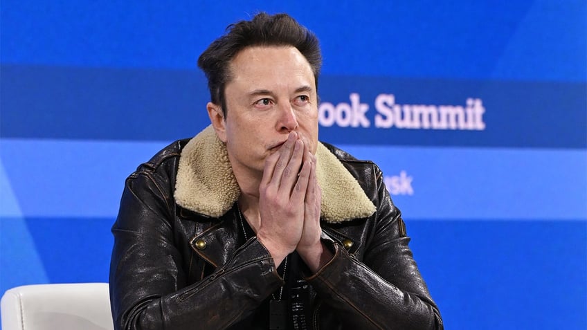 elon musk crudely hits critics as hypocritical virtue signalers who just care about looking good f them