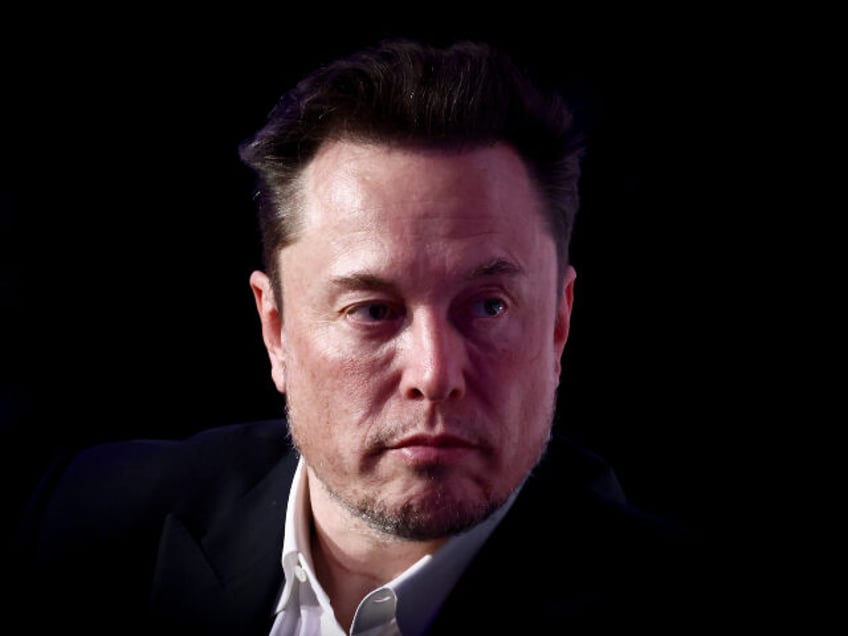 Elon Musk, owner of Tesla and the X (formerly Twitter) platform, attends a symposium on fi