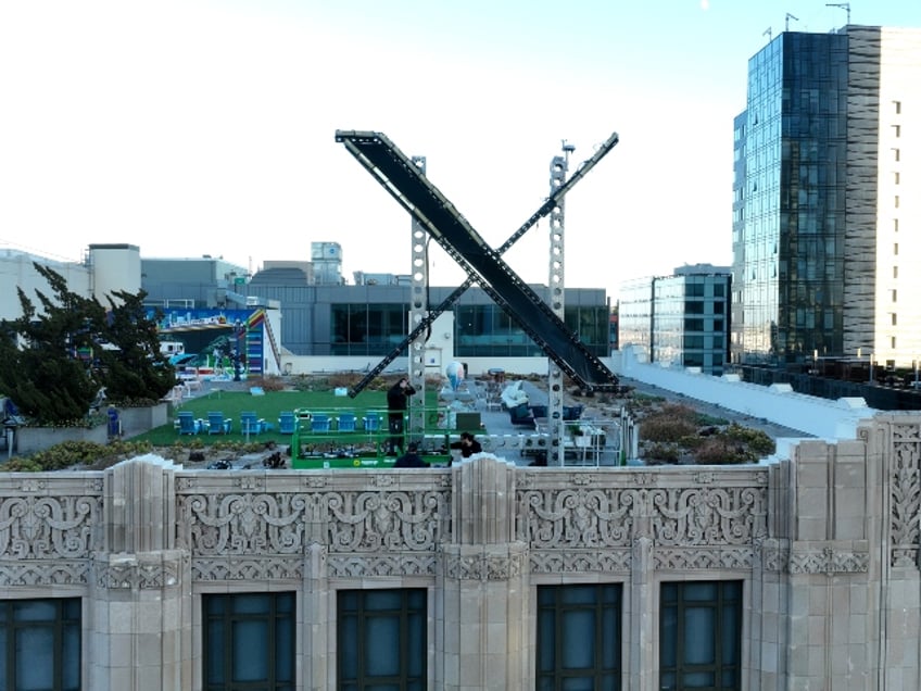 elon musks x corp dismantles giant glowing sign on san francisco twitter hq