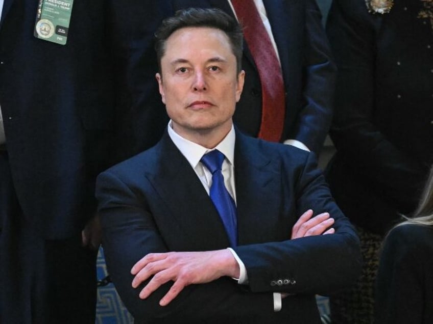 Elon Musk strikes a serious pose