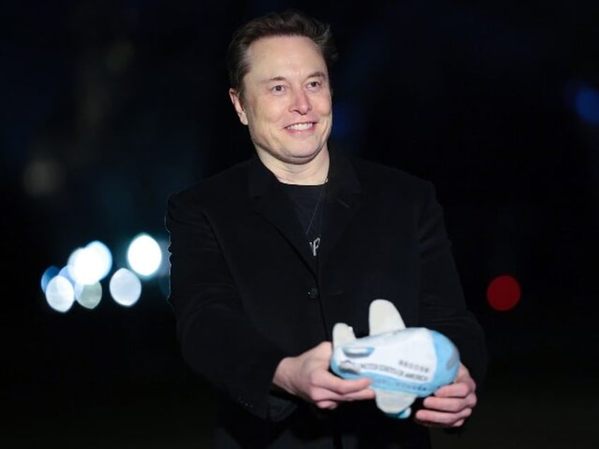 Elon Musk with a big smile