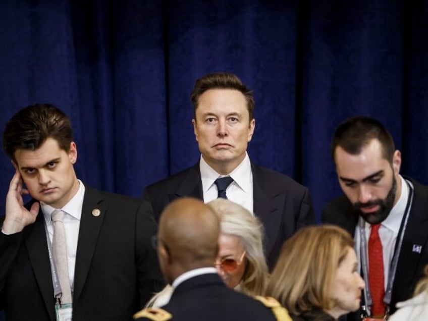 Elon Musk with a stern look on his faceElon Musk with a stern look on his face