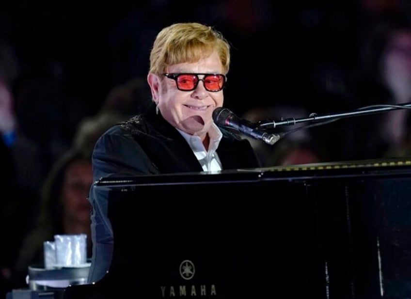 elton john addresses britains parliament urging lawmakers to do more to fight hiv aids