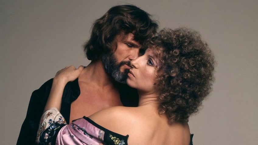 Kris Kristofferson embracing Barbra Streisand in A Star is Born