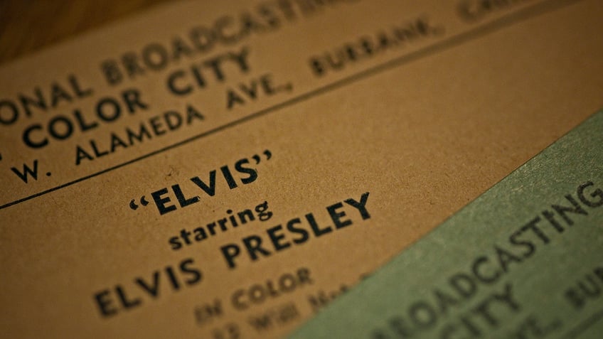 A sign announcing Elvis Presleys music