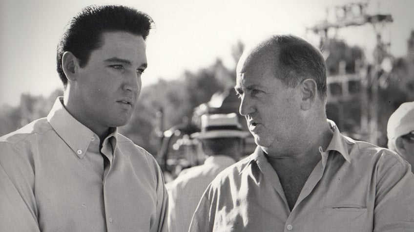 Elvis Presley talking to The Colonel.