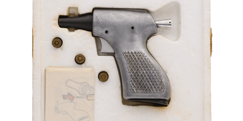 elvis presleys revolver plus rare spy guns to hit auction block in illinois see the photos