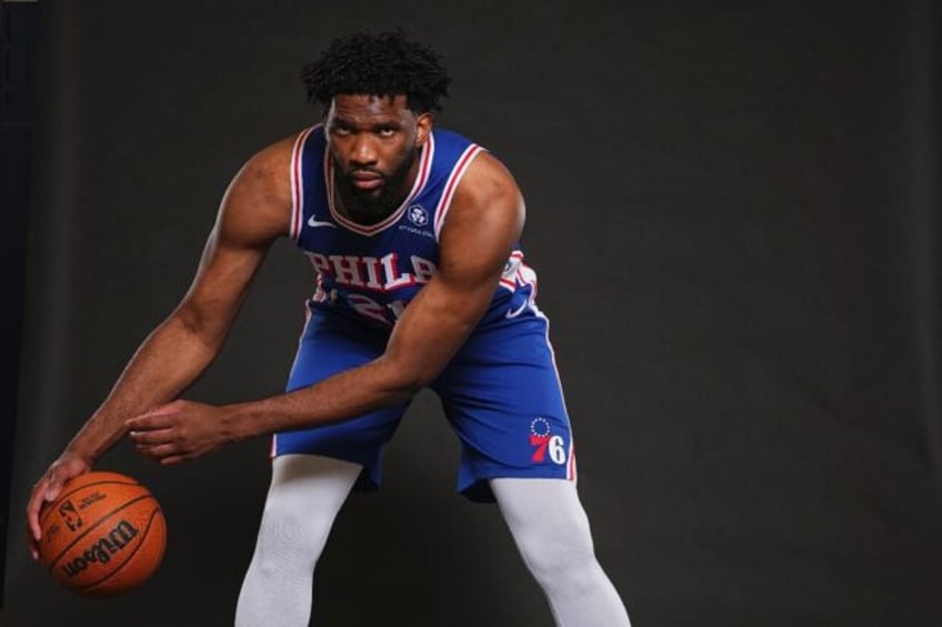 Philadelphia 76ers star Joel Embiid poses for a picture at media day prior to the NBA seas