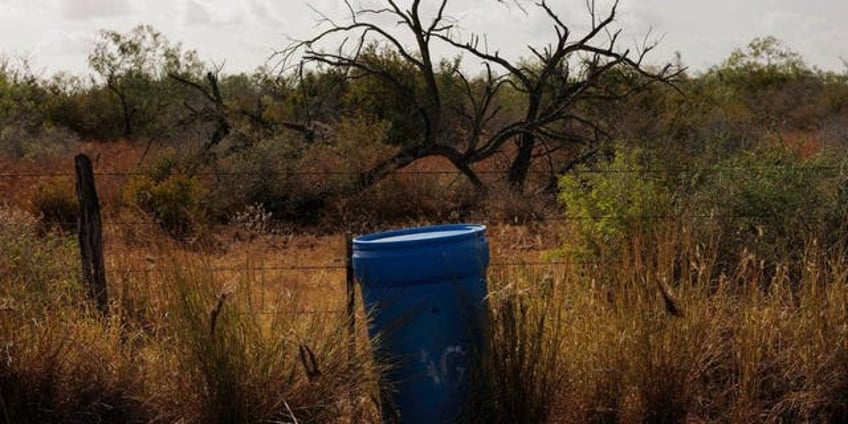 emergency water barrels for migrants disappear near border amid heat wave report