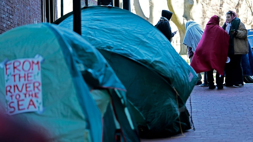 Boston protester tent with anti-Semitic slogan