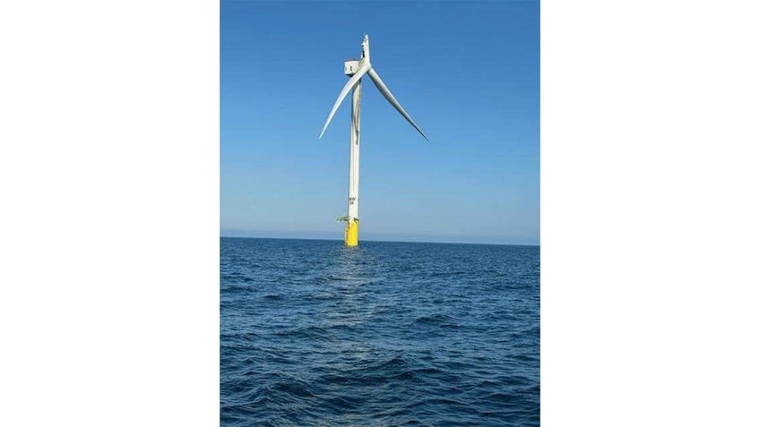 This image shows a windmill after a blade snapped off and fell into the Atlantic Ocean.