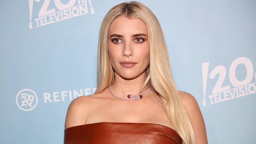 emma roberts accused of transphobic remark by american horror story co star my blood is boiling