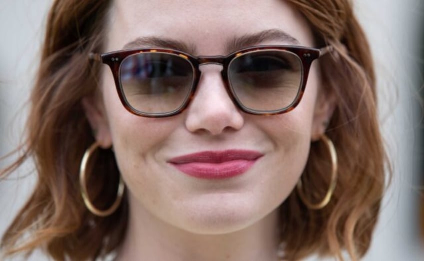 emma stone wows venice as sex mad reanimated corpse