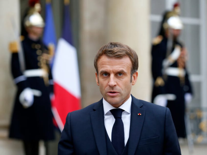 PARIS, FRANCE - NOVEMBER 30: French President Emmanuel Macron makes a statement next to Li