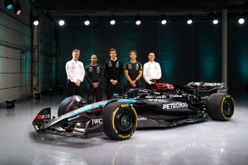 Lewis Hamilton (second from left) wants to get Mercedes 'back to where we once were' as he