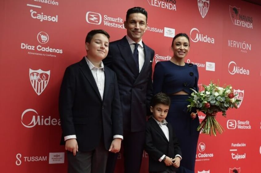 Sevilla's Spanish defender Jesus Navas and family during his farewell ceremony