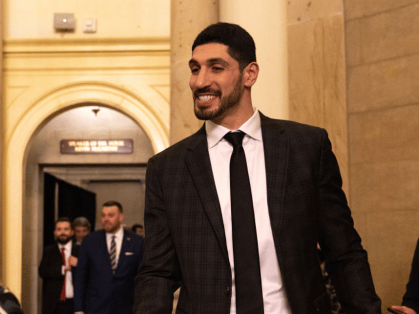 WASHINGTON, DC - FEBRUARY 07: Former NBA player Enes Kanter Freedom greets people ahead of