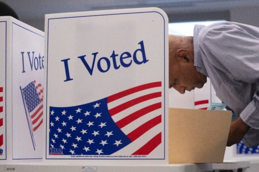 Early in-person voting kicked off in the US states of Virginia, South Dakota and Minnesota