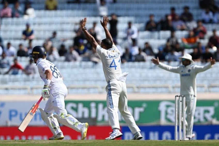 India's Akash Deep celebrates the dismissal of England's Ollie Pope