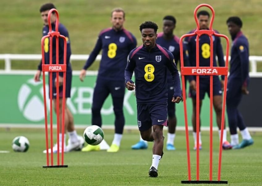Angel Gomes (centre) has received his first call-up to the England squad