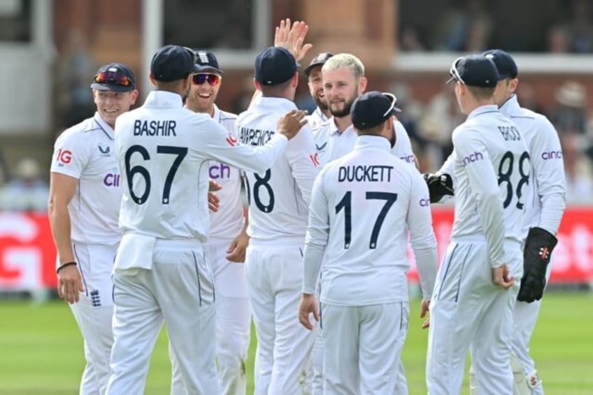 Key wicket: England's Gus Atkinson (C) celebrates dismissing Sri Lanka's Dinesh Chandimal