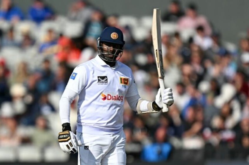 In the runs: Sri Lanka's Angelo Mathews reacts to reaching his half century