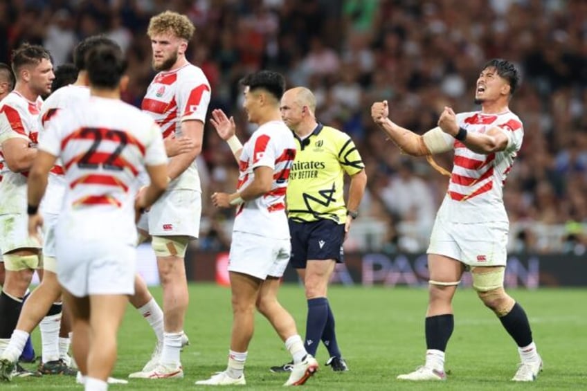 england into world cup quarter finals as japan beat samoa