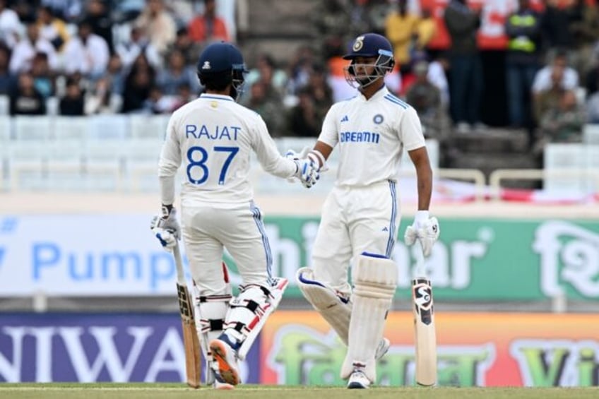 India's Yashasvi Jaiswal celebrates after scoring a half-century on the second day of the