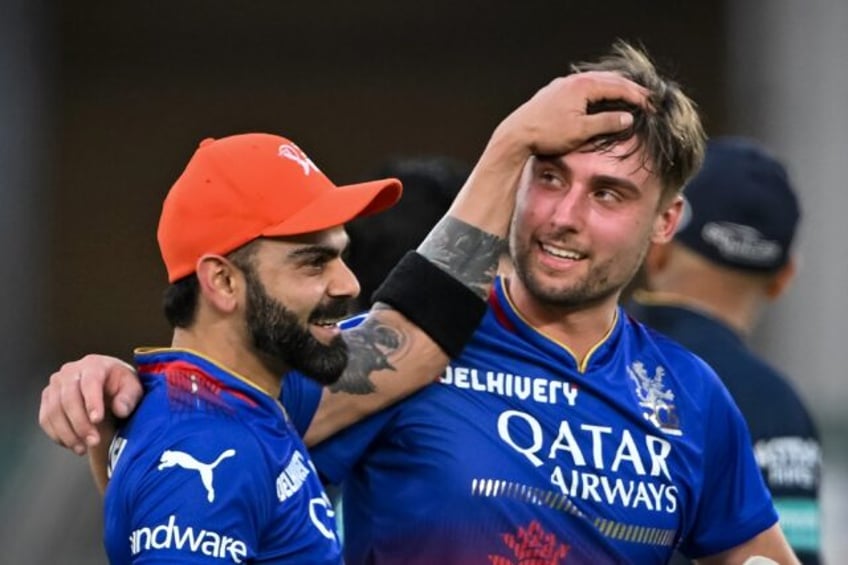 Top tips: Will Jacks (R) and Virat Kohli celebrate the Royal Challengers Bengaluru's win o
