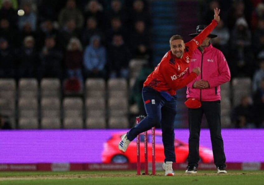 On the way back: England's Liam Livingstone bowls during the 1st T20 against Australia at