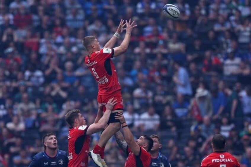 Hitting the heights at Toulouse: England flanker Jack Willis wins line-out ball during the