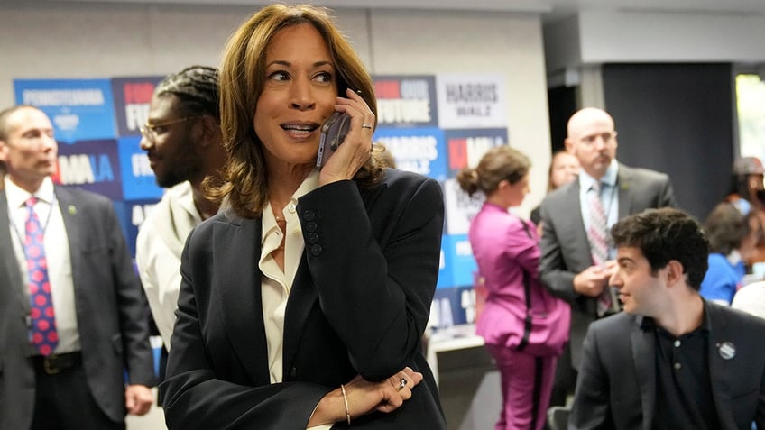 Kamala Harris phone banks with volunteers at the DNC headquarters on Election Day