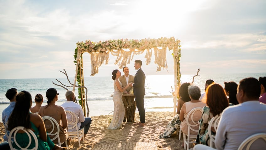 A beach wedding ceremony 