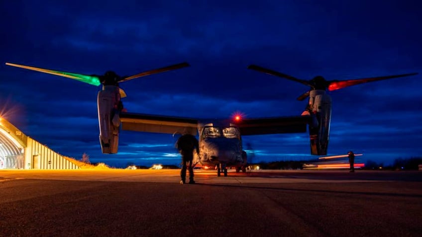 Marines inspect Osprey