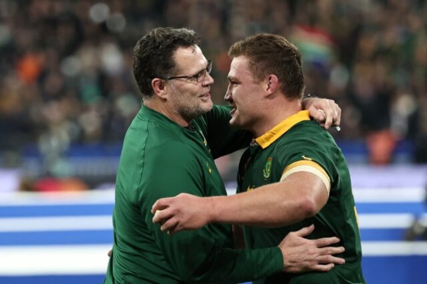 Rassie Erasmus (L) eyes a historic third successive Rugby World Cup title after committing to the Springboks till 2027