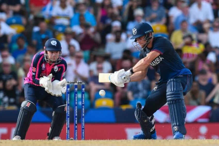 Gerhard Erasmus of Namibia hits a four after leading his team's recovery against Scotland