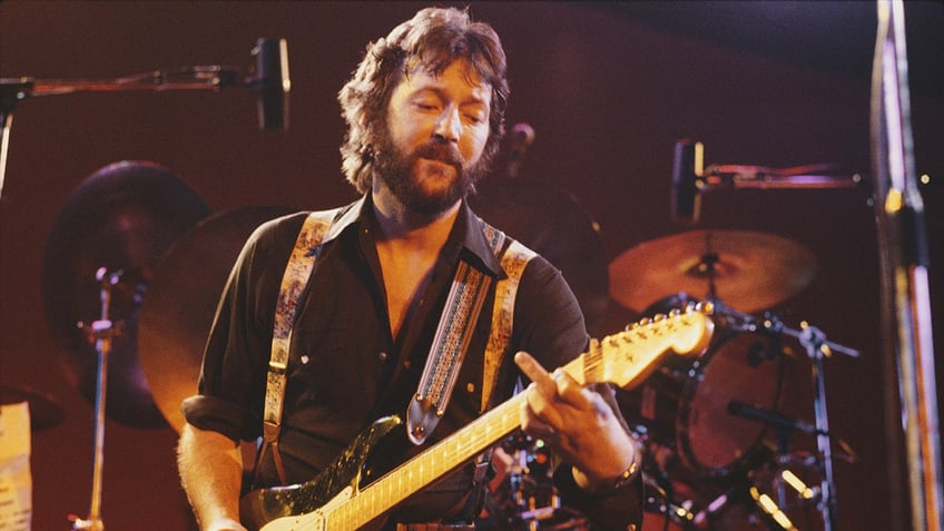 Eric Clapton performing on stage