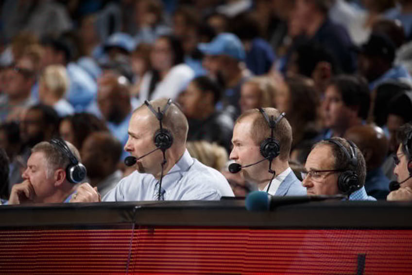 Eric Montross and Jones Angell , radio color analyst and play-by-play announcers respectively for the North Carolina Tar Heels, during a North...